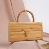 box shaped bamboo handbag, inspired by treasure chests, 100% bamboo material, unique and eye-catching accessory