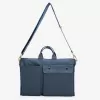 canvas working bag, multiple separate compartments, fits a laptop, can be worn crossbody or carried by hand