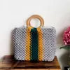 macrame bag with patterns and wooden handle, impressive and eye-catching color combination, unique accessory, a highlight for the outfit