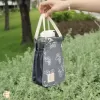 túi vải hình thang đựng bình nước, thiết kế thông minh và đa năng, quai cầm chắc chắn, khoang túi rộng rãi, có ngăn nhỏ đựng đồ