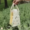 túi vải hình thang đựng bình nước, thiết kế thông minh và đa năng, quai cầm chắc chắn, khoang túi rộng rãi, có ngăn nhỏ đựng đồ