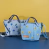 2-sided floral embroidery denim bucket bag from recycled jeans, size 21, recycled material, meticulous craftsmanship, sustainable product