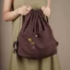 balo rút linen màu nâu, thêu tay, thiết kế dây rút chắc chắn, hoạ tiết thêu tay tỉ mỉ, gam màu nâu trầm mộc mạc, phong cách vintage