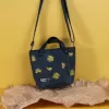 2-sided floral embroidery denim bucket bag from recycled jeans, size 21, recycled material, meticulous craftsmanship, sustainable product