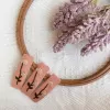 embroidered linen hair clip in warm color, smooth linen fabric, lovely small embroidered details, unique accent for hair