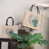 túi vải bố họa tiết lá, hoạ tiết nhiệt đới, chất liệu vải bố mộc mạc, khoang túi rộng rãi, dễ bảo quản, quai túi da chắc chắn
