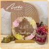 two flowers, round dried flower frame, conveying messages of love, decorative accessories, handcrafted product, meaningful gift