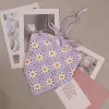 daisy crochet bandana, vibrant colors, adorable daisy pattern, gentle and pure design, vintage style