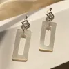 lighthouse earrings, sea lover collection, pure white color, large rectangular pendants, impressive design, inspired by the ocean