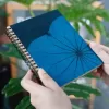 sổ lá sen, bìa sổ cứng và chắc chắn, hoạ tiết lá sen tinh tế và mộc mạc, kích thước vừa vặn, dễ mang theo, phù hợp ghi chép hàng ngày
