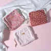 secret mini fabric wallet, compact design, secure clasp, gentle colors, feminine patterns, soft and smooth fabric