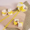 yellow persimmon ribbons, girls accessories set, vibrant yellow color, enhances child's adorableness, lovely gift for girls