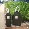 túi vải đựng bình nước dáng tạp dề độc đáo (apron bag), tiện lợi sử dụng hàng ngày, vải kaki bền chắc, có dây rút 2 bên