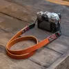 vachetta leather camera strap, flexible and durable material, rustic style, simple strap design, retro style