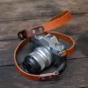 vachetta leather camera strap, flexible and durable material, rustic style, simple strap design, retro style