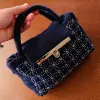“chàm” sashiko embroidery linen bag, handheld tote bag, compact and convenient size, modern design, gold metal lock and keyhole