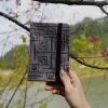 The Brocade Notebook, crafted with a cover of brocade fabric recycled from traditional H'Mong costumes, makes a meaningful gift for foreignersThe Brocade Notebook, crafted with a cover of brocade fabric recycled from traditional H'Mong costumes, makes a meaningful gift for foreigners
