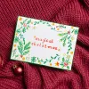 Spread Christmas cheer with the "Magical Christmas" Hand-Drawn Card—an original artwork, elegantly crafted paper card with envelope & stickers, perfect as a Christmas gift.