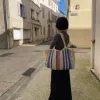 The Raffia Versa Longb_Col01 Tote Bag is the perfect choice for your active day, serving as a stylish daily handbag and a standout sustainable fashion accessory, making it a unique and thoughtful birthday gift.