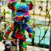 Gấu Trang Trí Từ Vải Chăn Con Công Là Một Tác Phẩm Đồ Chơi Thủ Công Độc Đáo, Tựa Như Một Món Đồ Chơi Bearbrick Với Sắc Màu Việt Nam, Lý Tưởng Để Làm Món Quà Tặng Ý Nghĩa Cho Người Thân Yêu