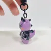 Móc khóa Rồng Tím đất sét thủ công sở hữu ngoại hình thú vị khiến ai cũng bật cười, đây hứa hẹn sẽ là mẫu móc khóa đất sét nhỏ gọn để làm món quà tặng thủ công đáng yêu