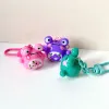 The Handmade Clay Colorful Frog Keychain boasts an adorable and charming look, making it the perfect clay bag charm, unique accessory, and lovely handmade gift, a thoughtful gift for her!
