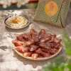 The "Reunion" Tet Gift Basket, a perfect blend of Vietnamese specialties, comes in a beautifully crafted traditional woven basket, making it an ideal premium Tet gift set for both personal and corporate gift giving.