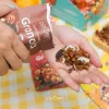 Savor the indulgent Brownie Crumble Granola—a pack of 10 cocoa-infused delights featuring nutritious grains, perfect as a diet-friendly, healthy snack or convenient meal option with its irresistible flavor and wholesome goodness