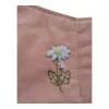 The Wild Daisy Embroidery Linen Face Mask combines elegance and functionality, offering a touch of serenity to each day with its 3-ply design, adjustable straps, and commitment to sustainability as an eco-friendly accessory