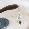 Trâm Cài Tóc Gỗ Tua Rua Quả Thông là điểm nhấn sáng tạo cho mái tóc, được chế tác thủ công với kỹ thuật điêu luyện, mang đến vẻ đẹp sang trọng và là món quà tặng ý nghĩa dành cho nữ