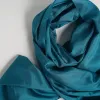 Deep Teal Silk Scarf, handwoven from natural silk, offers a deep tone for a refined look - an elegant fashion accessory and luxury gift for her, making it an impressive Vietnamese gift.