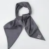This Grey Silk Square Scarf, a traditionally woven and handcrafted Vietnamese accessory made from natural silk, offers a subtle yet luxurious look, making it a thoughtful gift for her
