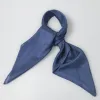 Khăn Lụa Vuông Navy với sắc xanh trầm cuốn hút, kết hợp khăn tơ tằm thủ công và khăn dệt truyền thống, tạo nên vẻ đẹp bí ẩn đầy quyến rũ, là phụ kiện sang trọng và quà Việt Nam ấn tượng dành tặng phái đẹp