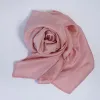 The Rose Pink Silk Scarf embodies dreamy soft beauty, crafted from natural silk as a luxurious Vietnamese souvenir and an impressive gift for her that exudes elegance and timeless charm