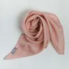 The Rose Pink Silk Scarf, handcrafted from natural silk, beautifully enhances her youthful glow, making it a timeless feminine accessory that blends tradition with elegance - an exquisite Vietnamese gift perfect for her