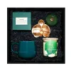 The "Peaceful" Gift Set, fostering a serene spirit, includes a beautifully curated gift box featuring a ceramic mug, a scented candle, and a tea set, making it a delicate gift for all occasions and a perfect Vietnamese gift