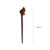 The Traditional Wooden Leaf Hair Stick is a timeless handmade hair accessory that beautifully embraces classic elegance, making it a perfect traditional accessory to elevate any hairstyle - an ideal gift for her or a heartfelt gift for mom