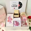 The "Actually" Valentine Gift Box creates a romantic love melody, featuring a charming music box, elegant glass, and decadent chocolate - the perfect Valentine's Day gift for her to cherish and celebrate love