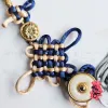Set Quà "Định Duyên" là món lễ vật đính ước mang ý nghĩa nối kết duyên lành, với sợi Đồng Tâm Kết và liễn thư, là quà Valentine độc đáo và quà tặng phong thủy đầy ý nghĩa.