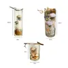 The Flying Jellyfish Jar is a creatively shaped seashell jar, a mesmerizing DIY artwork in glass, bringing the ocean home - a perfect artistic decoration and gift for her.