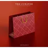 The "Reunion" Gift Box celebrates identity through flavors with apricot liquor, tea, coffee, and confectionery, elegantly curated into a luxurious gift