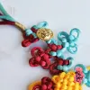 The "Nhu Y" Knot Moon Hanging Decoration is a beautiful traditional ornament that serves as a positive energy source, making it a perfect Feng Shui gift and decorative accessory for any space - an elegant and meaningful gift for her.