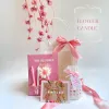 The "Flower Candle" Gift Set is a charming blind bag gift box with scented wax, a notebook, and a ballpoint pen, making it an adorable Women's Day gift for your girlfriend or any cute gift to cherish special moments