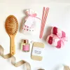 The "Glowin' Up" Gift Box is the perfect Women's Day surprise, designed to embrace her aura with a curated set of body care essentials and a mystery blind bag, making it a romantic gift for your girlfriend on March 8th.