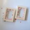 Khung Gỗ Ép Hoa Khô Chữ Nhật Viết Chữ Theo Yêu Cầu là món quà cá nhân hóa đầy ý nghĩa, giúp bạn trao gửi những lời tinh tế qua từng cánh hoa khô được sắp đặt tỉ mỉ, vừa là khung tranh trang trí thanh lịch, vừa lưu giữ những thông điệp yêu thương theo cách riêng của bạn.Khung Gỗ Ép Hoa Khô Chữ Nhật Viết Chữ Theo Yêu Cầu là món quà cá nhân hóa đầy ý nghĩa, giúp bạn trao gửi những lời tinh tế qua từng cánh hoa khô được sắp đặt tỉ mỉ, vừa là khung tranh trang trí thanh lịch, vừa lưu giữ những thông điệp yêu thương theo cách riêng của bạn.