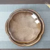 Đĩa Hoa Anh Đào Men Nâu Tuyết Hỏa Biến là tuyệt tác đồ gốm Bát Tràng thủ công, mang vẻ đẹp đậm đà và tinh tế, là điểm nhấn hoàn hảo cho không gian của bạn, đồng thời là món quà tân gia sang trọng đầy ý nghĩa.