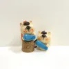 The Handmade Clay Cat Hugging Fish Keychain boasts a charming look that everyone adores, making it a lovely accessory - a handcrafted bag charm and clay keychain that's the perfect cute gift for her