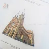 The Notre Dame Cathedral Postcard from the I Love Saigon Collection beautifully captures the city's landmarks in a handmade, layered paper design, making it a unique souvenir complete with an elegant envelope