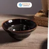The Chestnut Brown Fire-Glazed Slender-Waisted Bowl, also known as the Chiet Yeu Bowl, is a stunning piece of Vietnamese traditional craftsmanship, embodying the elegance of Bat Trang ceramics—a perfect Vietnamese ceramic souvenir for those who appreciate artistry and heritage
