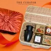 Discover the "Vietnam Flavor Treasure" Gift Set, a premium taste of Vietnam with specialty treats, a ceramic mug, and a traditional coffee filter